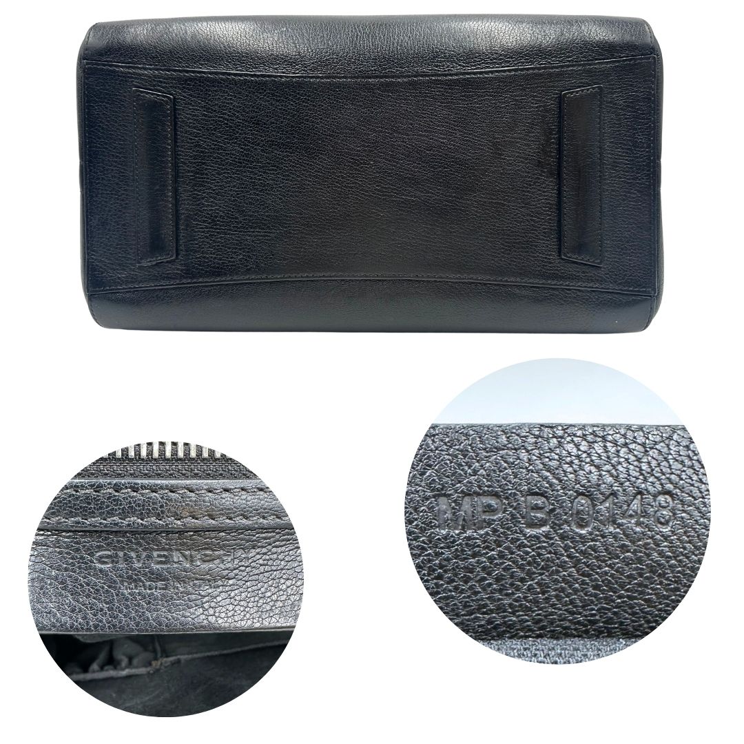 Base e codice di una borsa Givenchy Antigona in pelle nera dalla metalleria argentata, usata, originale, second hand, in ottime condizioni.