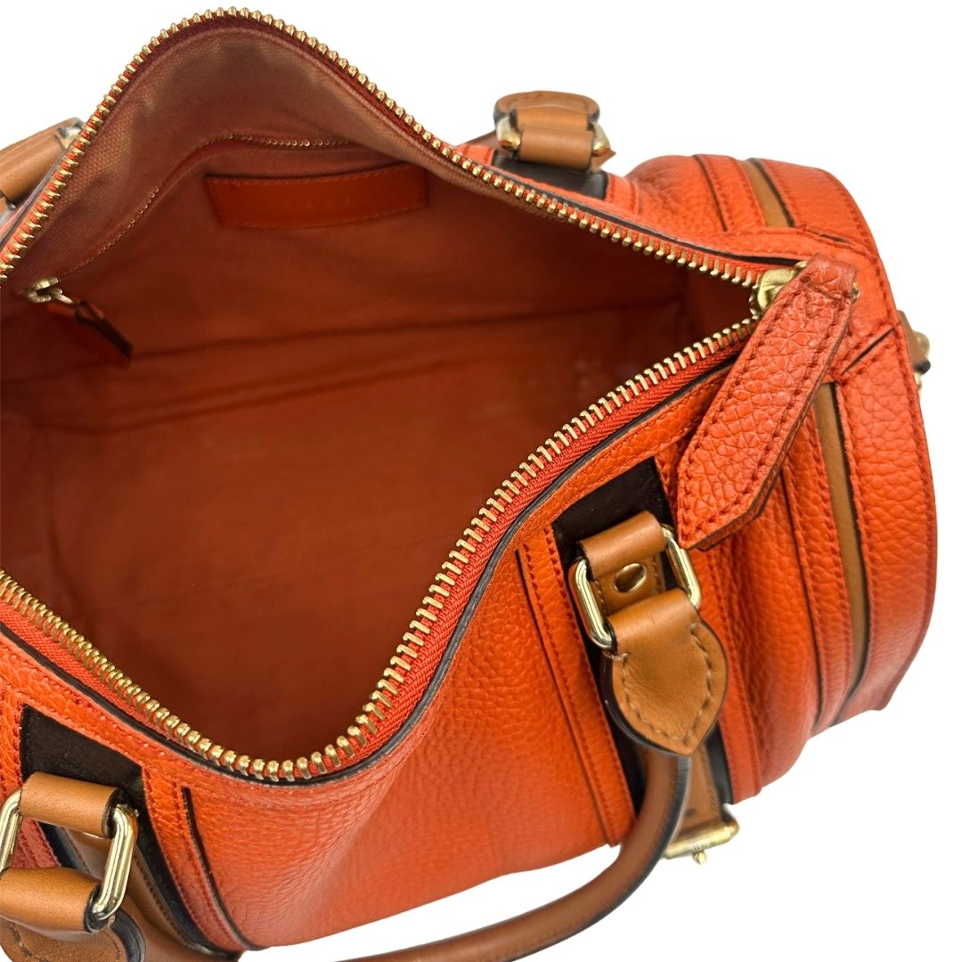 Interno di un bauletto Burberry arancione usato, originale, in ottime condizioni, second hand.