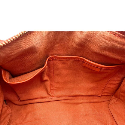 Interno di un bauletto Burberry arancione usato, originale, in ottime condizioni, second hand.