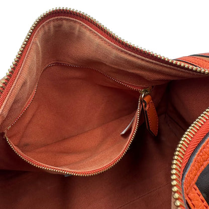 Interno di un bauletto Burberry arancione usato, originale, in ottime condizioni, second hand.