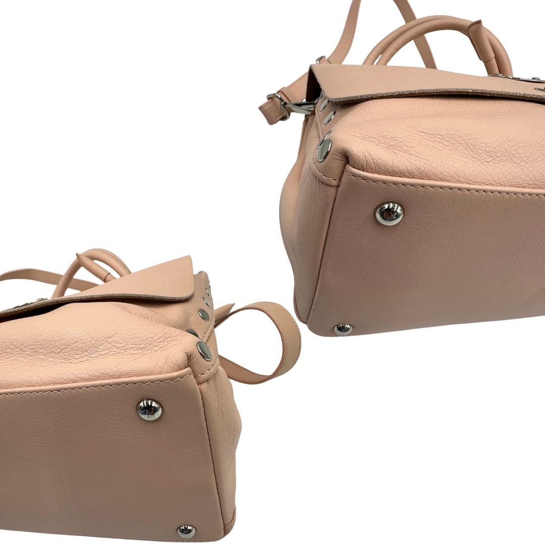 Angoli di una postina S Zanellato rosa usata, originale, second hand, in ottime condizioni.