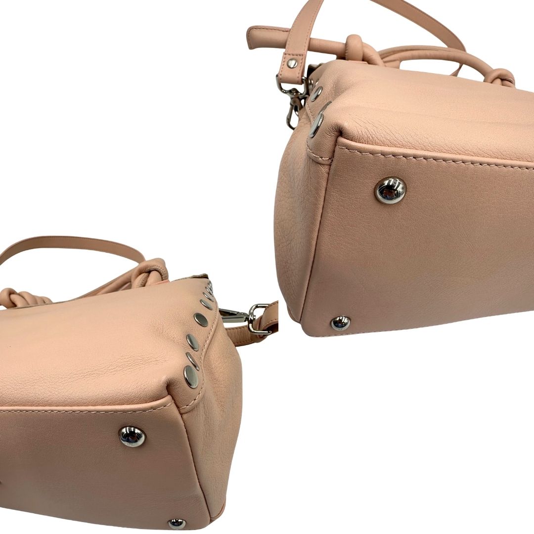 Angoli di una postina S Zanellato rosa usata, originale, second hand, in ottime condizioni.