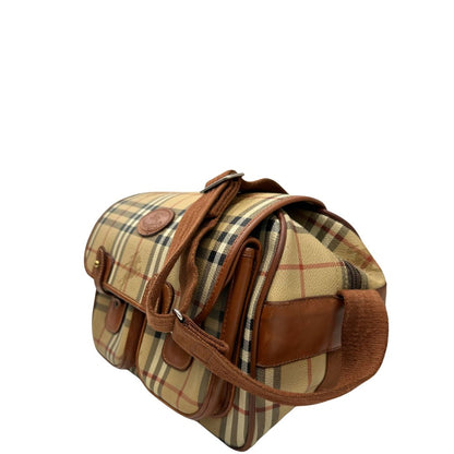 Laterale destro di una borsa Burberry trama tartan, con metalleria dorata, usata, originale, second hand, in ottime condizioni.