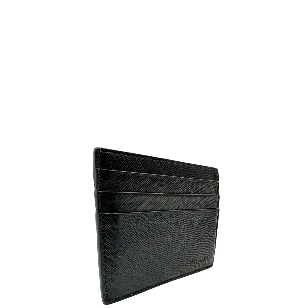 Lato destro, Portafoglio Prada in pelle Saffiano nera. Originale, usato, di lusso, in ottime condizioni