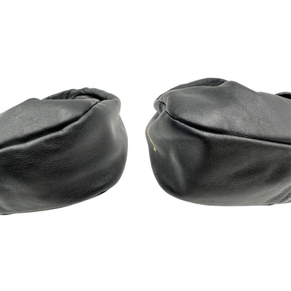 Angoli di una borsa modello hobo Borbonese in morbida pelle nera, con metalleria dorata, usata, originale, second hand, in ottime condizioni.