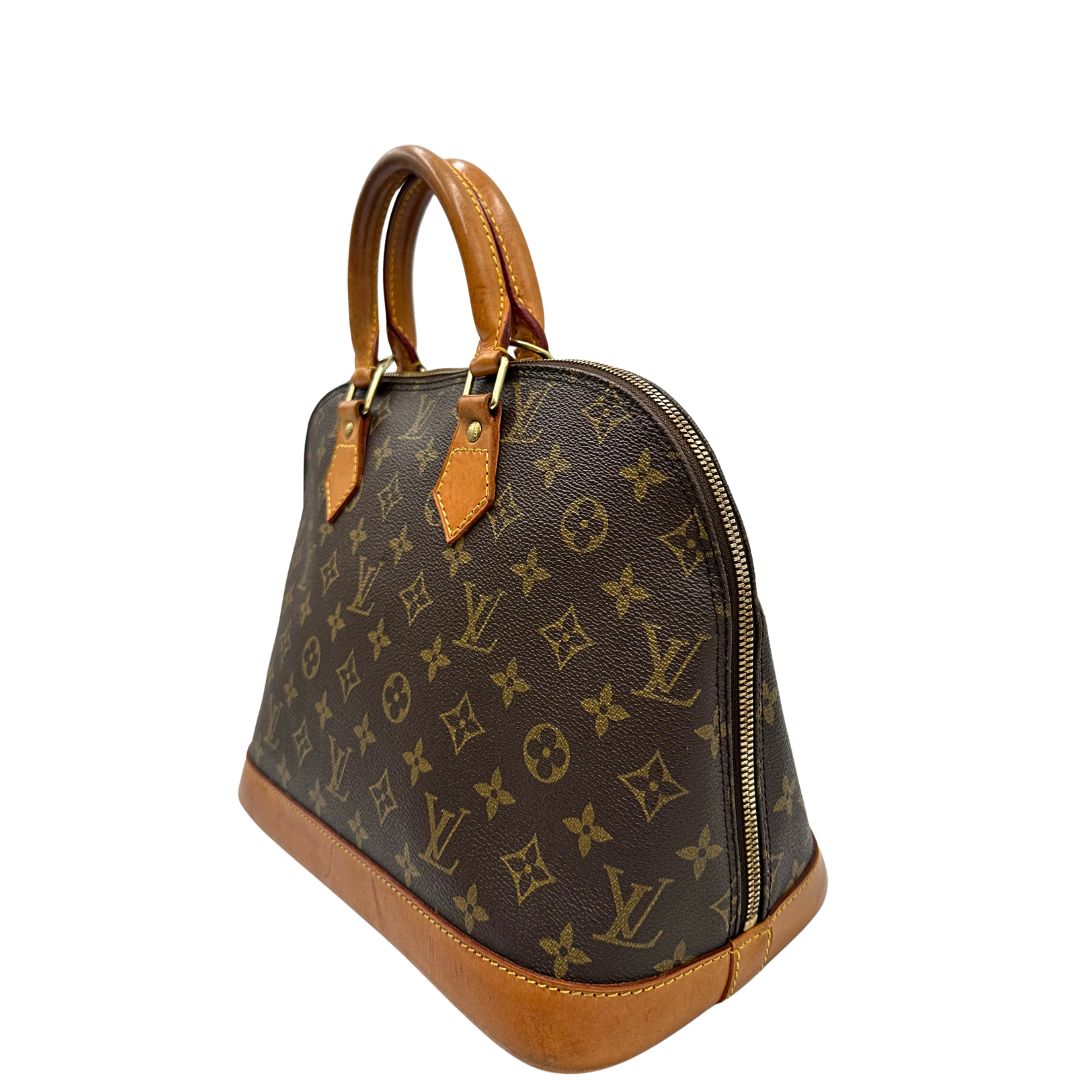 lato  Louis Vuitton Alma in tela monogram nella versione PM, di lusso, originale, ottime condizioni, usata, originale. 