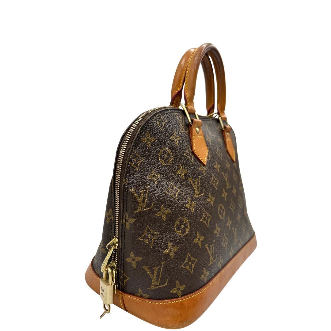 lato  Louis Vuitton Alma in tela monogram nella versione PM, di lusso, originale, ottime condizioni, usata, originale. 