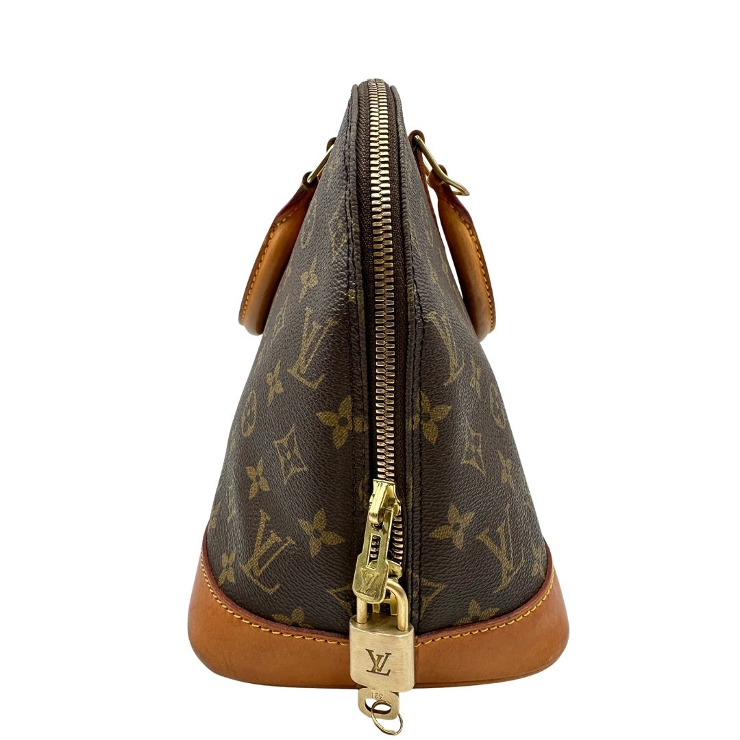lato  Louis Vuitton Alma in tela monogram nella versione PM, di lusso, originale, ottime condizioni, usata, originale.