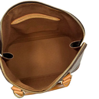 interno  Louis Vuitton Alma in tela monogram nella versione PM, di lusso, originale, ottime condizioni, usata, originale. 