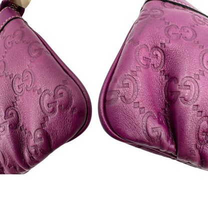 angoli Pochette Gucci GG viola con hardware dorato, di lusso, ottime condizioni, usata, originale. 