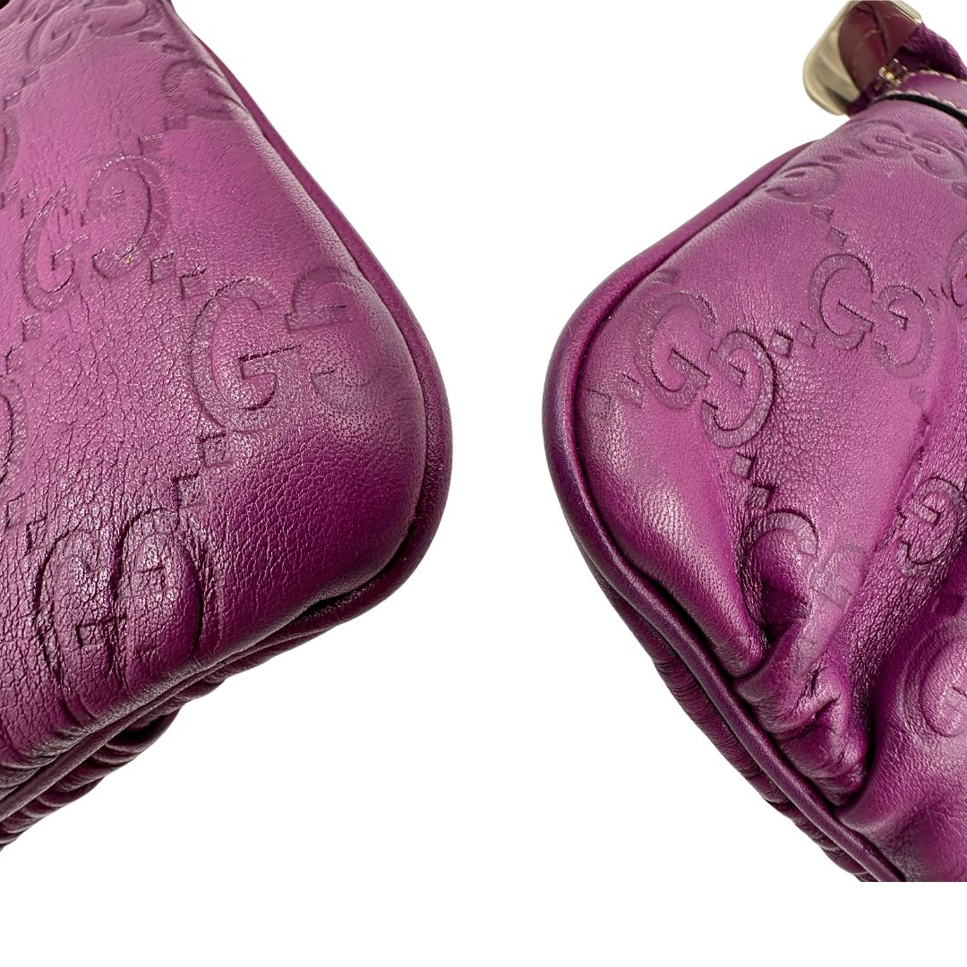 angoli Pochette Gucci GG viola con hardware dorato, di lusso, ottime condizioni, usata, originale. 