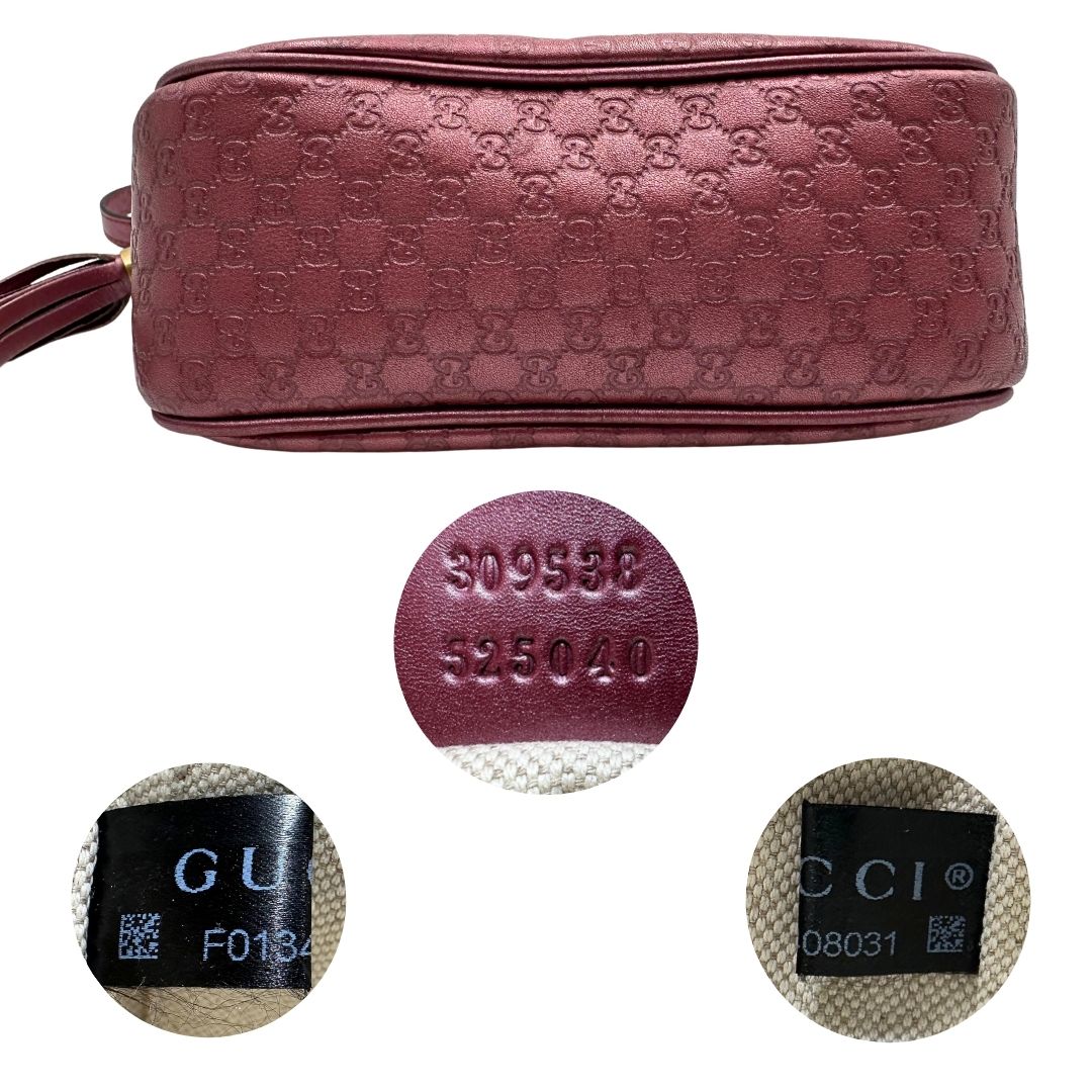 Base e codici di una tracolla Gucci Microguccissima in color rosa metallizzato, con nappa decorativa con dettaglio bambù