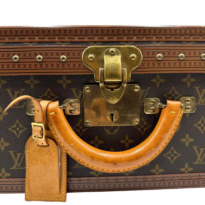 manico Valigia Alzer 70 in canvas monogram, munita di un accessorio porta address amovibile, di lusso, originale, ottime condizioni, usata. 