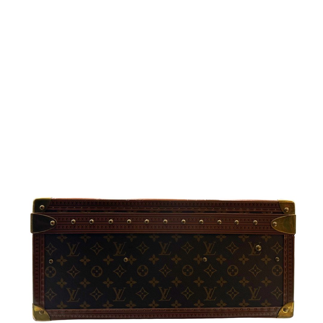 lato Valigia Alzer 70 in canvas monogram, munita di un accessorio porta address amovibile, di lusso, originale, ottime condizioni, usata. 