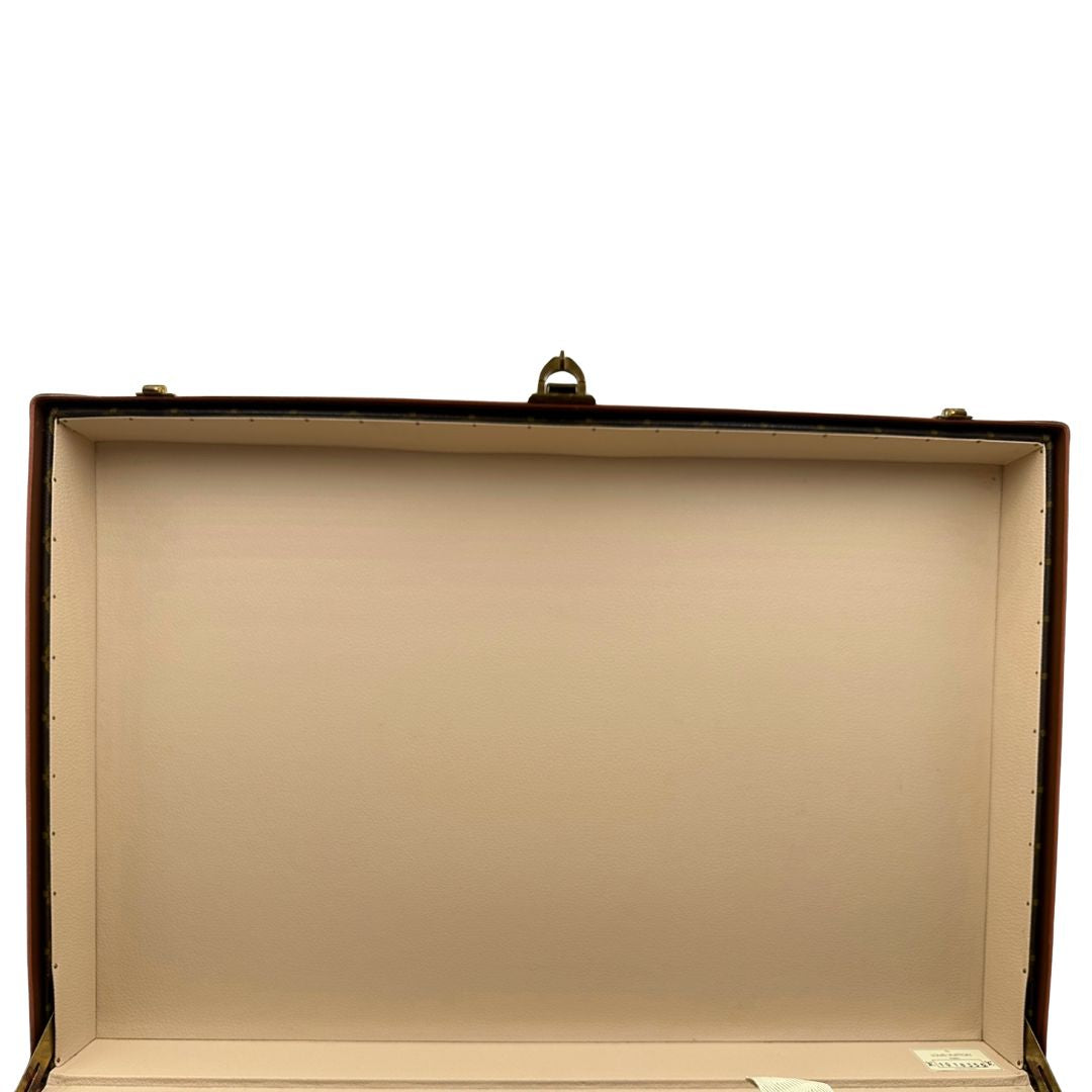interno Valigia Alzer 70 in canvas monogram, munita di un accessorio porta address amovibile, di lusso, originale, ottime condizioni, usata. 