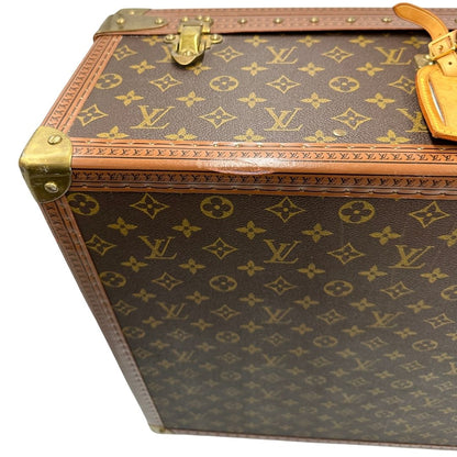 lato Valigia Alzer 70 in canvas monogram, munita di un accessorio porta address amovibile, di lusso, originale, ottime condizioni, usata. 