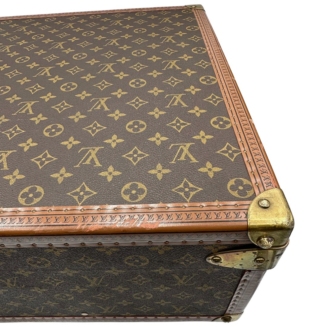 angolo Valigia Alzer 70 in canvas monogram, munita di un accessorio porta address amovibile, di lusso, originale, ottime condizioni, usata. 
