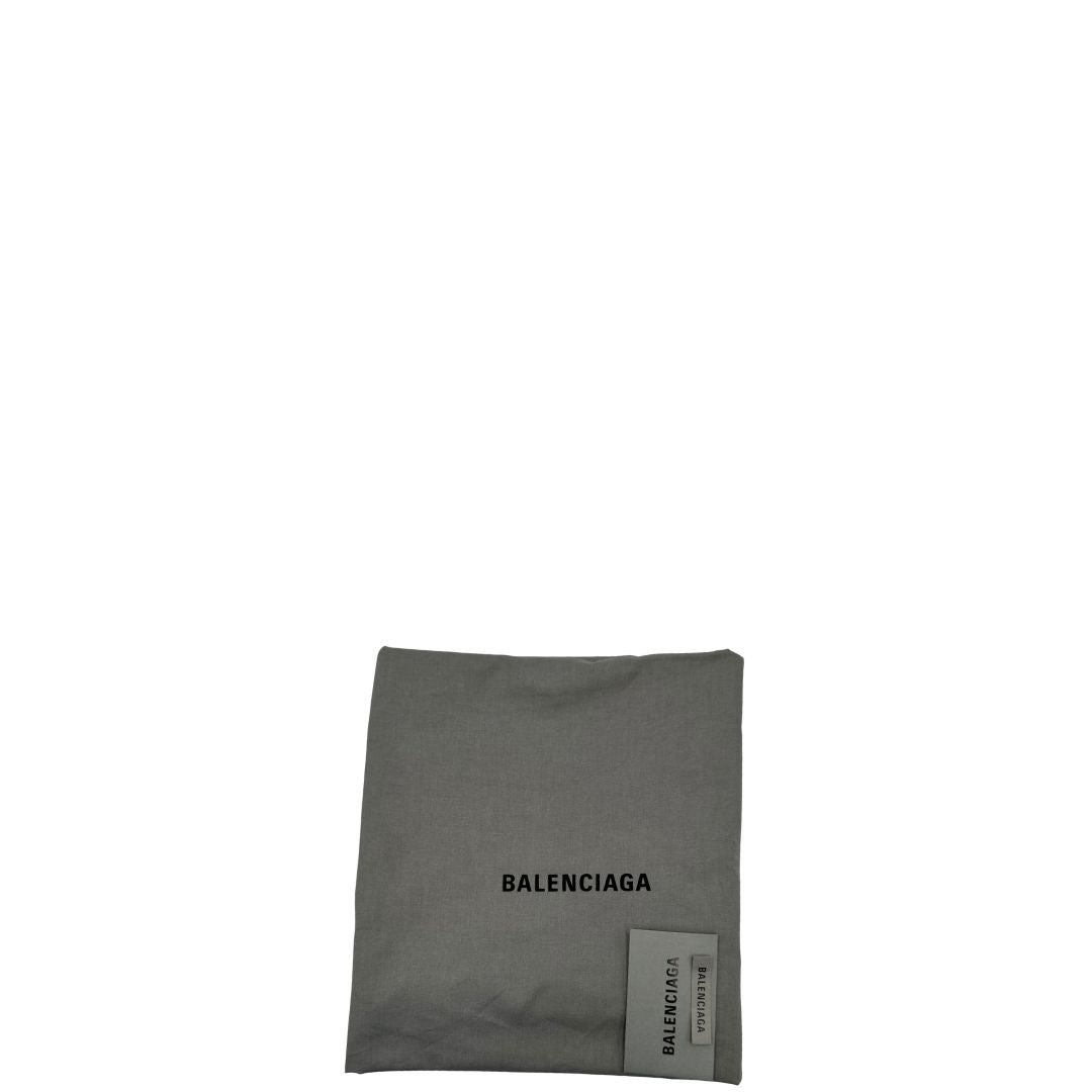 dustbag Tote Balenciaga in pelle nera, indossabile a spalla, di lusso, originale, ottime condizioni, usata. 