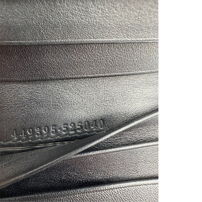 Codice, Portafoglio Gucci in pelle GG nera con hardware dorato. Originale, usato, di lusso, in ottime condizioni.