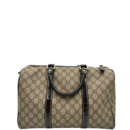 Retro di un bauletto Gucci Supreme in canvas beige e dettagli in pelle marroni.