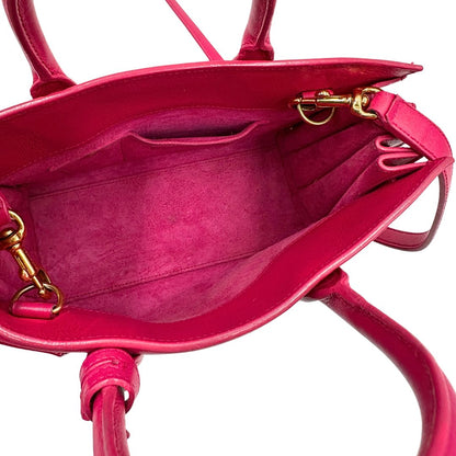 interno  Borsa Saint Laurent in pelle rosa, indossabile a tracolla o a mano, di lusso, originale, ottime condizioni, usata. 