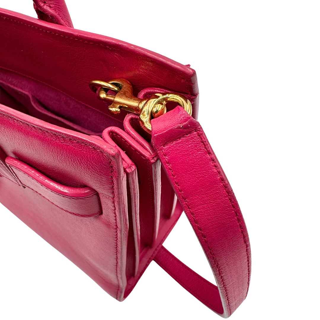lato  Borsa Saint Laurent in pelle rosa, indossabile a tracolla o a mano, di lusso, originale, ottime condizioni, usata. 