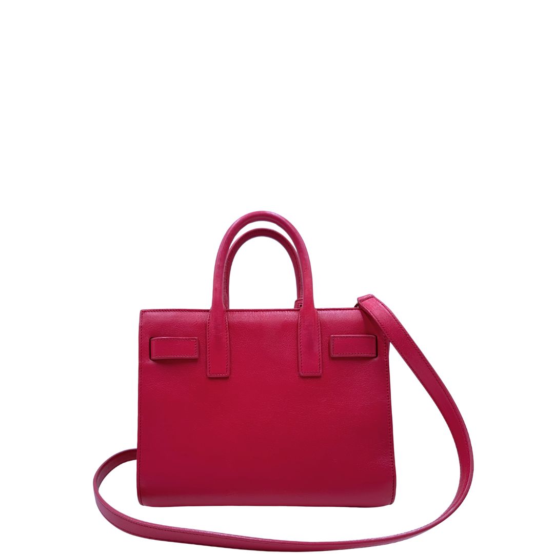 retro  Borsa Saint Laurent in pelle rosa, indossabile a tracolla o a mano, di lusso, originale, ottime condizioni, usata.