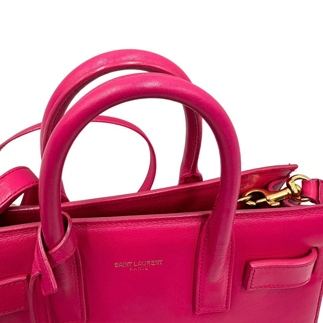 manici  Borsa Saint Laurent in pelle rosa, indossabile a tracolla o a mano, di lusso, originale, ottime condizioni, usata. 