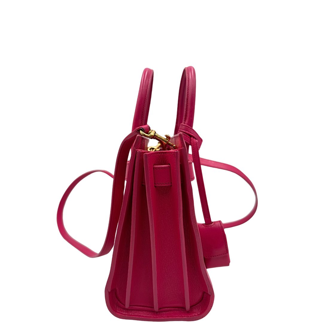 lato  Borsa Saint Laurent in pelle rosa, indossabile a tracolla o a mano, di lusso, originale, ottime condizioni, usata. 
