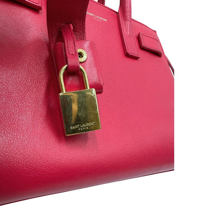 lucchetto  Borsa Saint Laurent in pelle rosa, indossabile a tracolla o a mano, di lusso, originale, ottime condizioni, usata. 