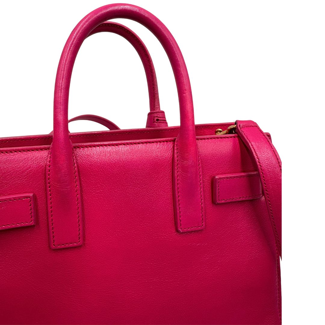 manici  Borsa Saint Laurent in pelle rosa, indossabile a tracolla o a mano, di lusso, originale, ottime condizioni, usata. 