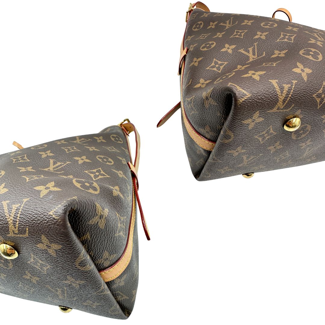 angoli Borsa CarryAll MM  realizzata in tela Monogram e rifinita in pelle naturale, di lusso, originale, ottime condizioni, usata. 