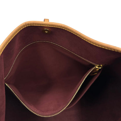 interno Borsa CarryAll MM  realizzata in tela Monogram e rifinita in pelle naturale, di lusso, originale, ottime condizioni, usata. 