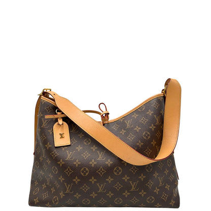 front Borsa CarryAll MM  realizzata in tela Monogram e rifinita in pelle naturale, di lusso, originale, ottime condizioni, usata. 