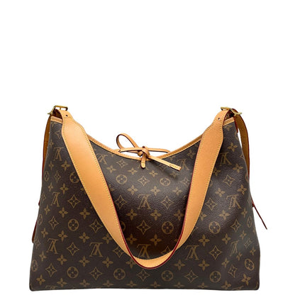 retro Borsa CarryAll MM  realizzata in tela Monogram e rifinita in pelle naturale, di lusso, originale, ottime condizioni, usata. 