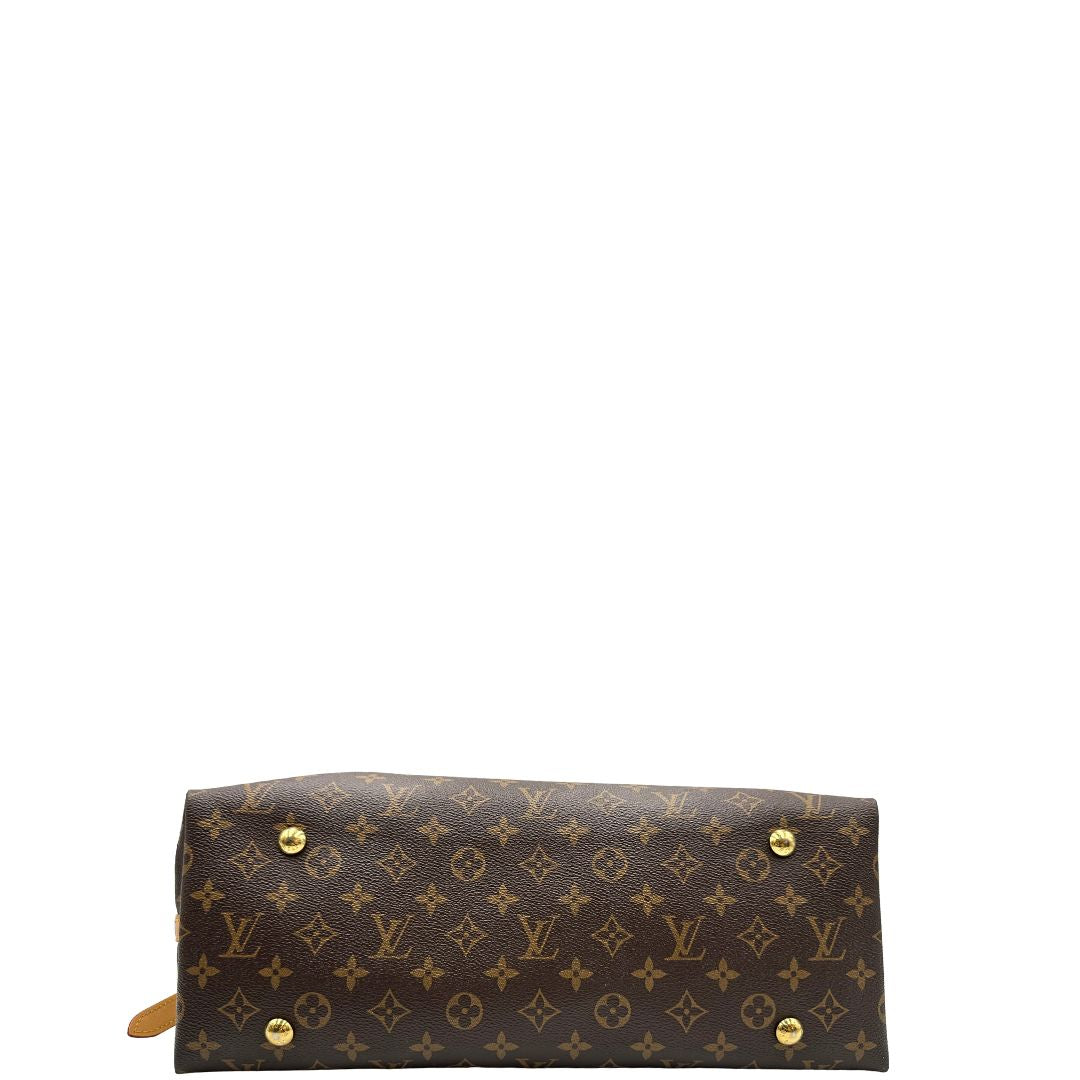 base Borsa CarryAll MM  realizzata in tela Monogram e rifinita in pelle naturale, di lusso, originale, ottime condizioni, usata. 