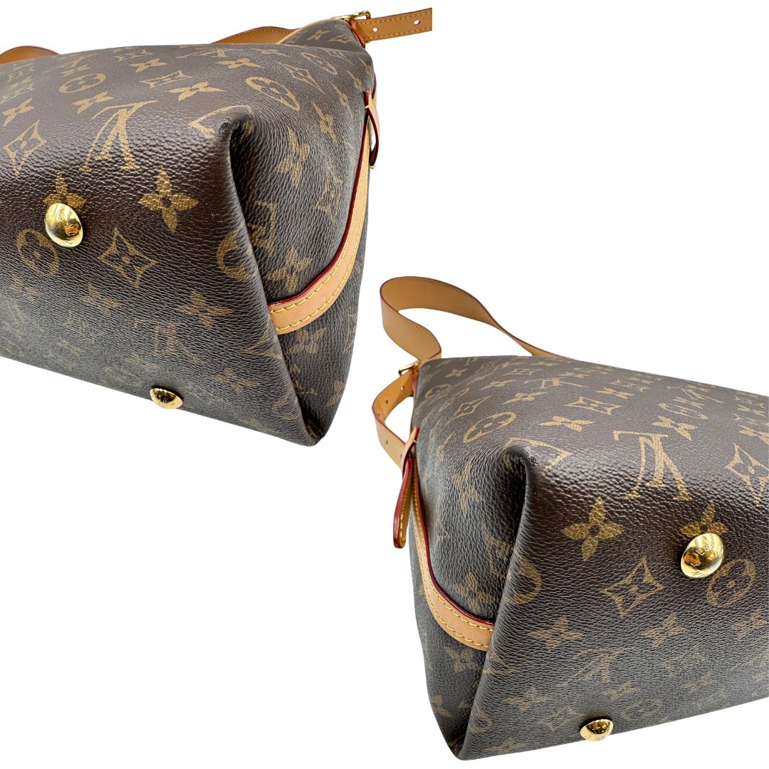 angoli Borsa CarryAll MM  realizzata in tela Monogram e rifinita in pelle naturale, di lusso, originale, ottime condizioni, usata. 