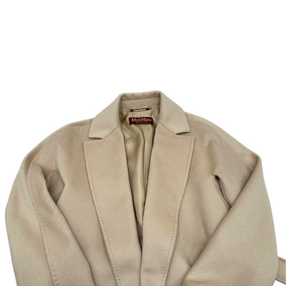 Cappotto Max Mara in lana vergine, di una calda tonalità color avorio, usato, originale, second hand, in ottime condizioni.