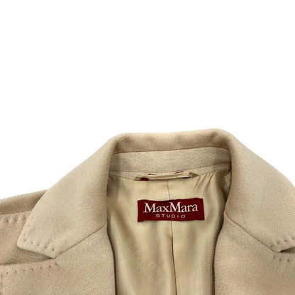 Cappotto Max Mara in lana vergine, di una calda tonalità color avorio, usato, originale, second hand, in ottime condizioni.