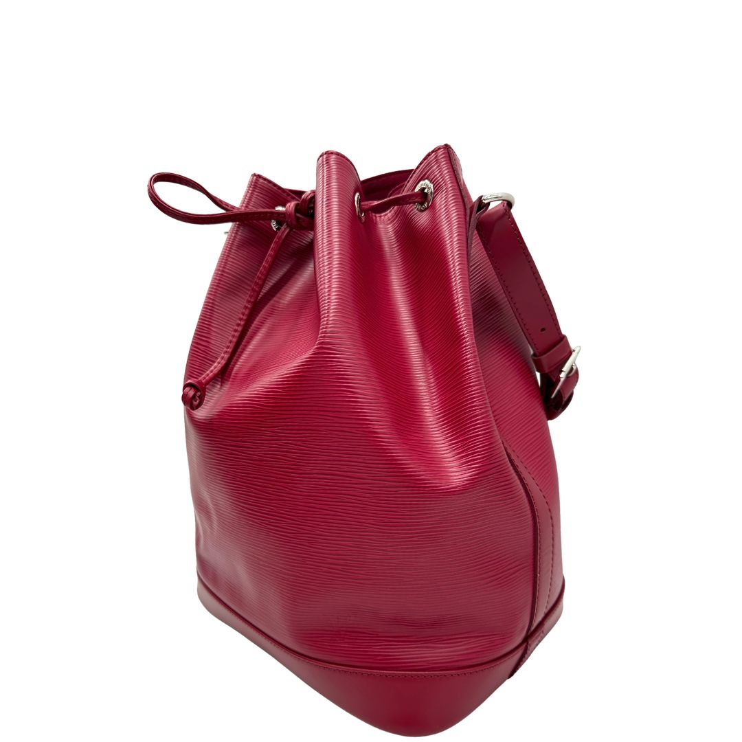 lato Secchiello LV in pelle epi color magenta, di lusso, originale, ottime condizioni, usata. 