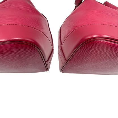angoli Secchiello LV in pelle epi color magenta, di lusso, originale, ottime condizioni, usata. 