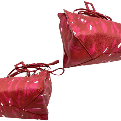 Angoli di una borsa Balenciaga Papier multicolore, con parti metalliche argentate e comodo specchietto amovibile, usata, originale, second hand, in condizioni eccellenti.