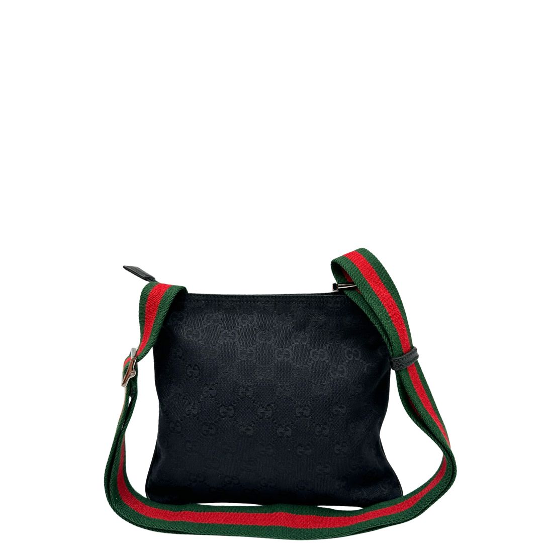 Retro di una borsa Gucci GG con tracolla Web regolabile e finiture in pelle nere, usata, originale, second hand, in ottime condizioni.
