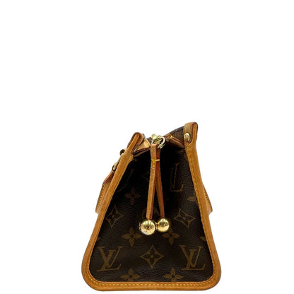 Dettaglio sfere decorative del tirante di una borsa LV Popincourt realizzata in tela Monogram con parti in vacchetta naturale, usata, originale, second hand, in ottime condizioni.