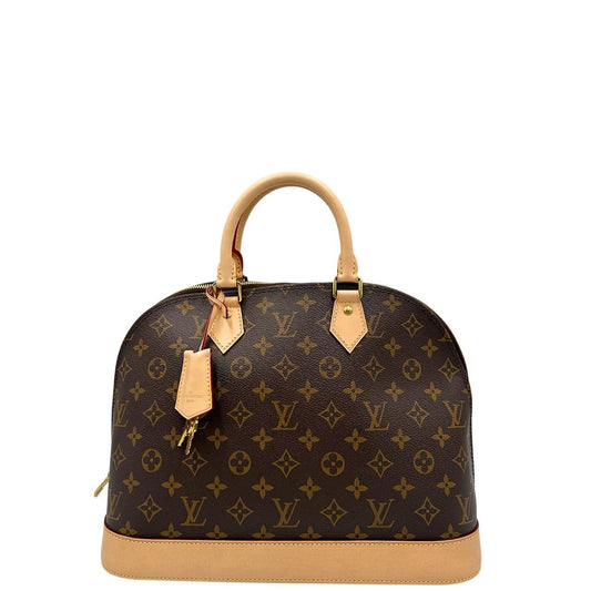 Front di una borsa Alma MM LV in canvas monogrammato e dettagli in vacchetta naturale, usata, originale, second hand, in condizioni eccellenti.