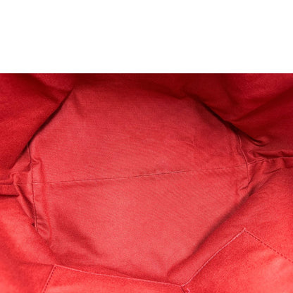 Interno di una shopper Burberry in canvas trama tartan con finiture in pelle bordeaux, usata, originale, second hand, in ottime condizioni.