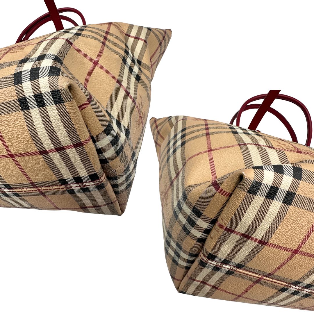 Angoli di una shopper Burberry in canvas trama tartan con finiture in pelle bordeaux, usata, originale, second hand, in ottime condizioni.