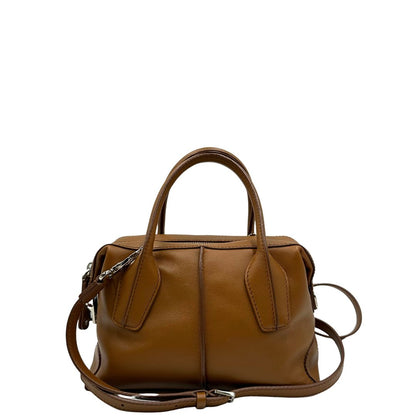 Retro, Borsa Tod's in morbida pelle color cammello e hardware argentato, indossabile a mano oppure a tracolla. Originale, usata, di lusso, in ottime condizioni.