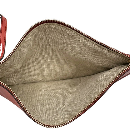 Interno di una pochette di una shopper Gucci Craft in tela beige, con finiture in pelle color rosa corallo, usata, originale, second hand, in ottime condizioni.