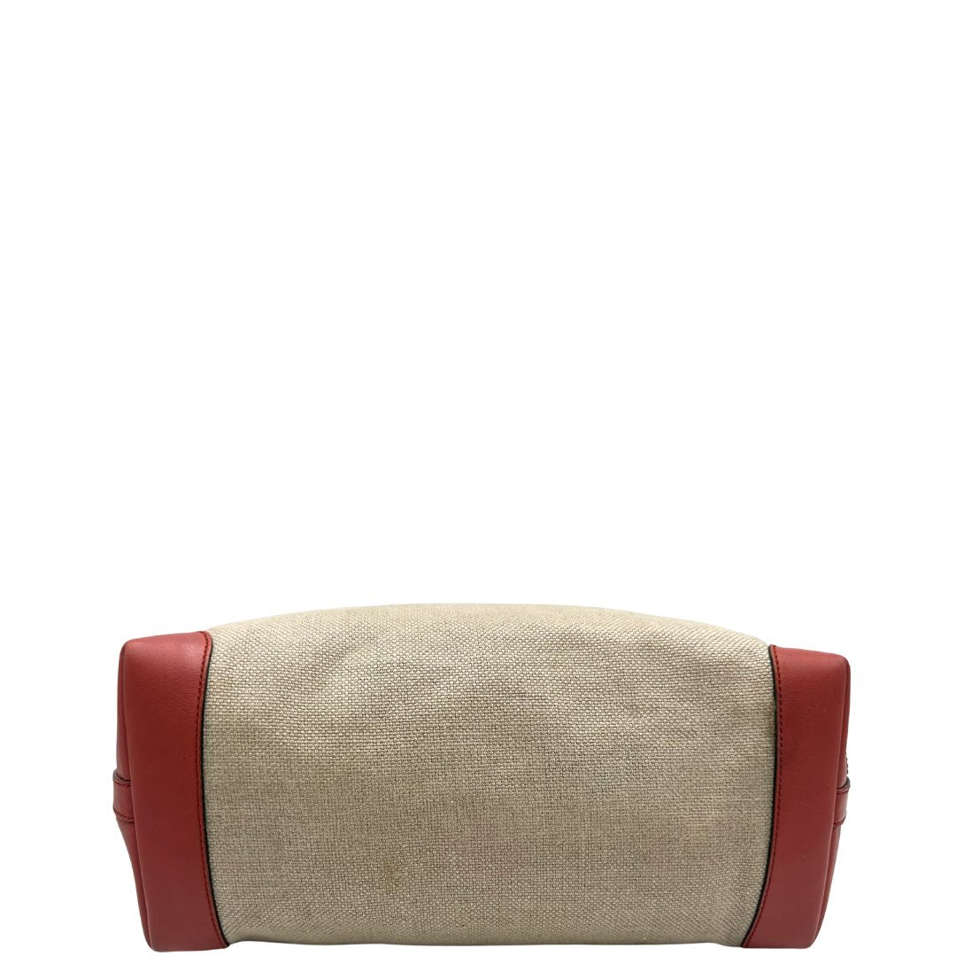 Base di una shopper Gucci Craft in tela beige, con finiture in pelle color rosa corallo. Dotata anche di una comoda pochette estraibile, usata, originale, second hand, in ottime condizioni.